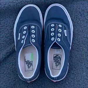 size womens 7, men’s 5.5 navy blue vans